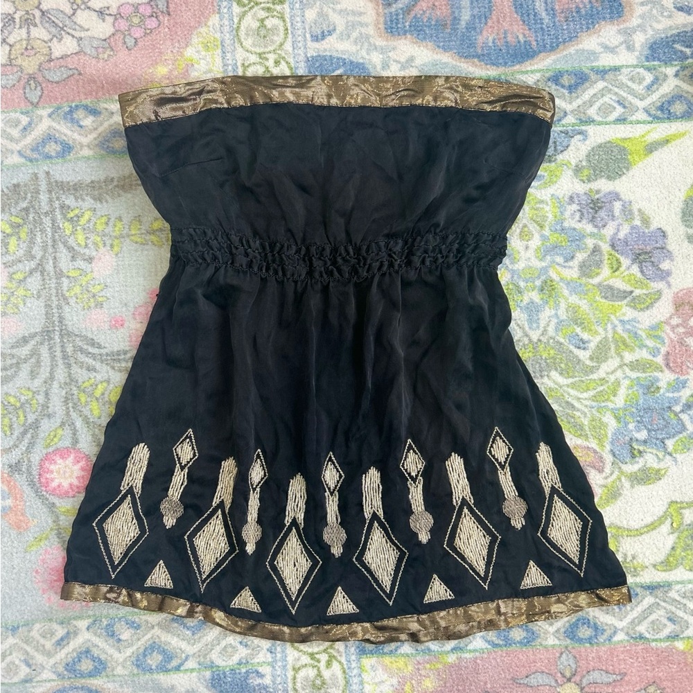 Black boho Y2K tube top with beaded and embroidered details.